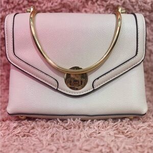 Elegant Cream Handbag with Gold Accents